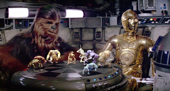 Chewbacca, C3PO e R2D2, jogando o jogo holográfico Dejarik star wars